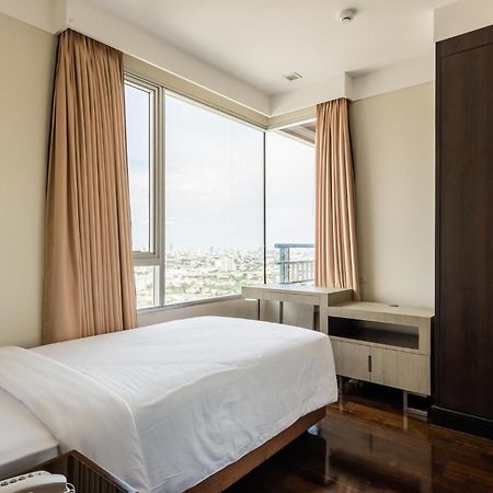 茉莉花豪华公寓-Sha认证 曼谷 外观 照片 A bedroom in a serviced apartment in Cairo, Egypt