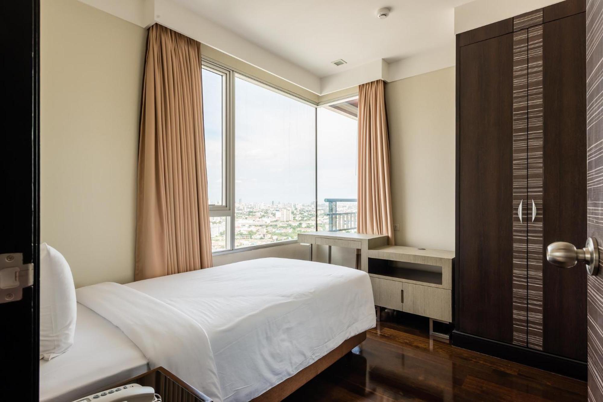 茉莉花豪华公寓-Sha认证 曼谷 外观 照片 A bedroom in a serviced apartment in Cairo, Egypt